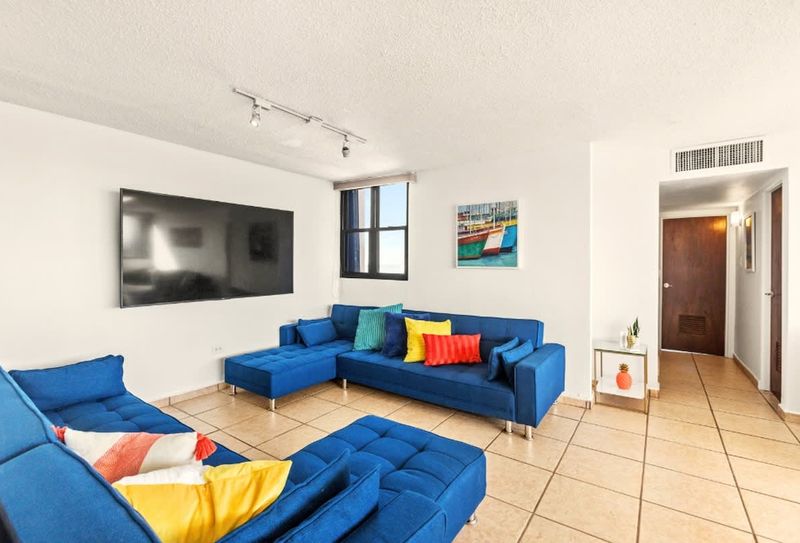 Spacious living room, ideal for entertainment or relaxation.