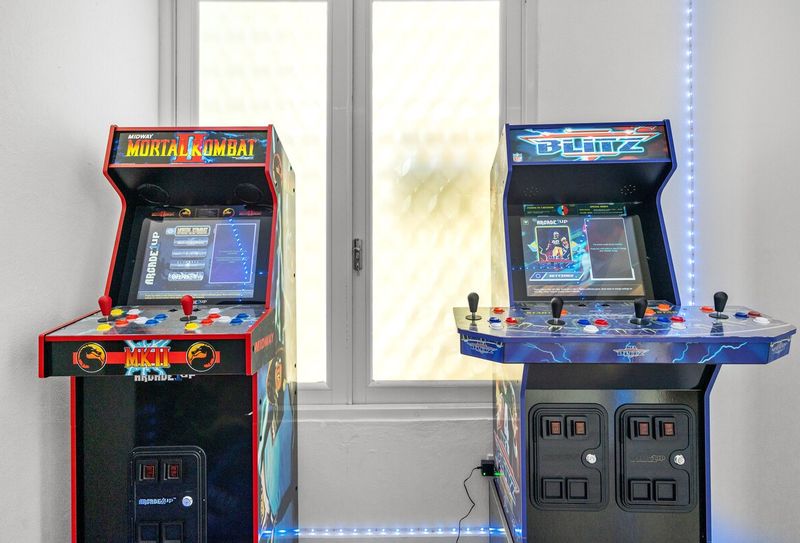 Private retro arcade room with two classic game cabinets