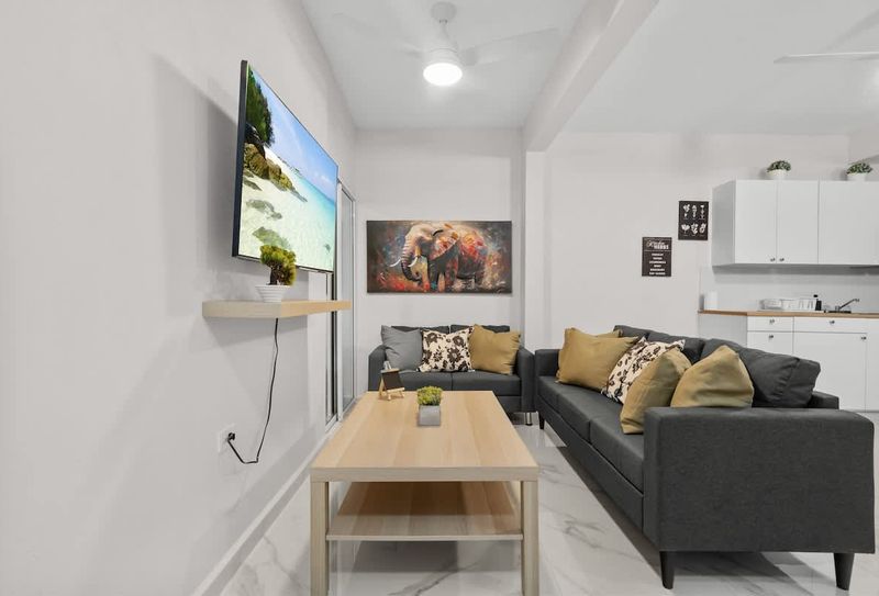 Cozy living room with large TV for movie nights!