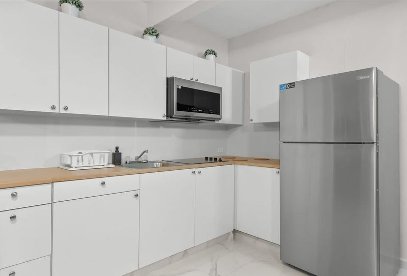 Fully stocked kitchen with new appliances. Cook like home!