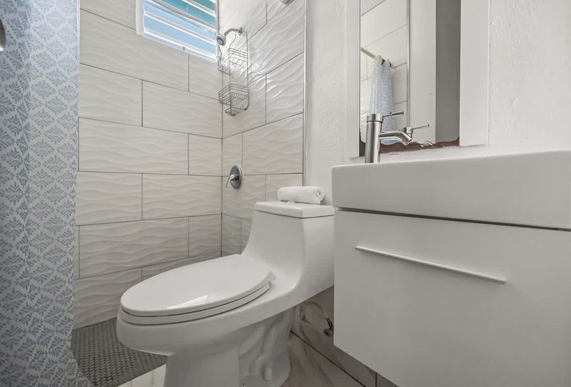 Modern fixtures, sparkling clean vanity space.