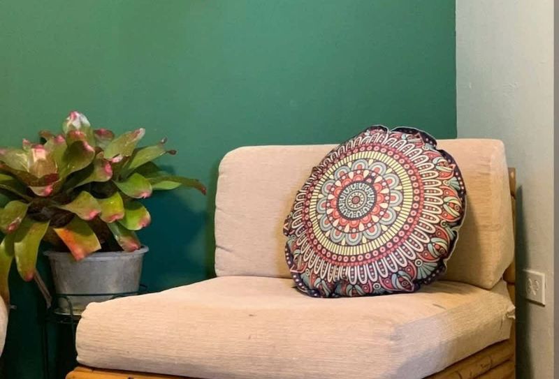 Bohemian | Eco Friendly Stay 4 A quiet corner with a comfortable chair, designed for your relaxation.