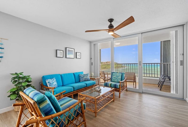 Marina | Beachfront Rental 2 Your ultimate vacation haven! Enjoy stunning panoramic ocean vistas from the comfort of this beautifully decorated living space. Ideal for family gatherings or a quiet evening admiring the sunset.