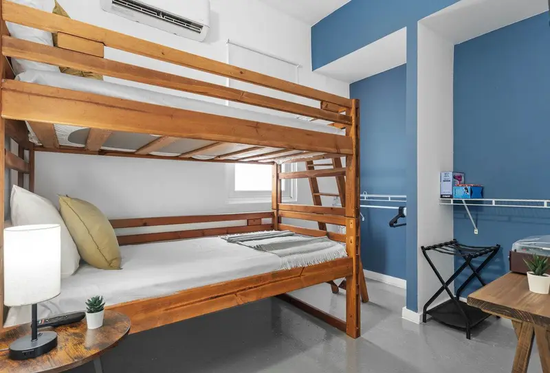 Bedroom 2 with twin bunk beds, A/C & open closet