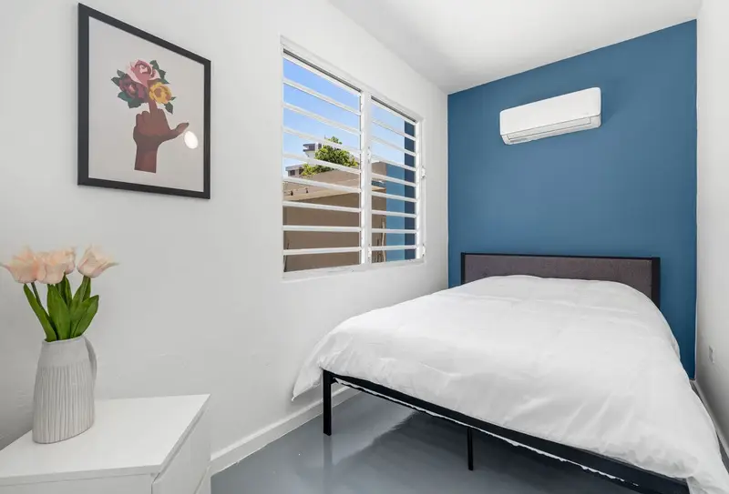 Condado 2BR for 6 | Living Room | 6-Min to Beach 3 Queen bedroom 2 with A/C and natural light