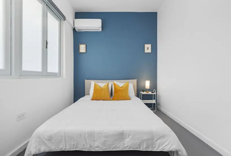 Second queen bedroom with A/C and crisp hotel-style linens