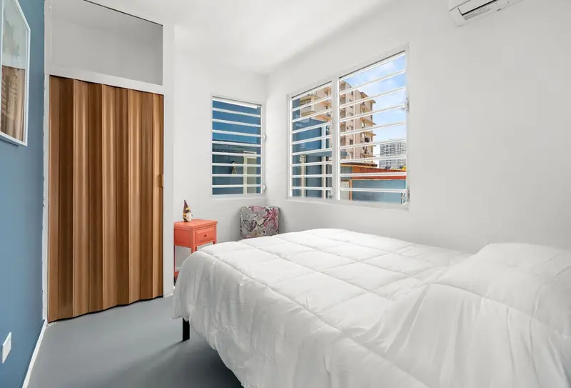 Third queen bedroom with closet & reading chair