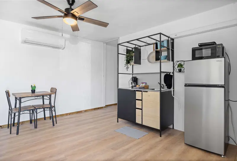 Kitchenette with full-size fridge & dining for two