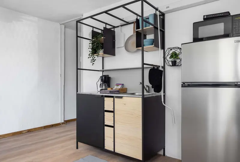 Airport Hideaway 8 Min to SJU | Pets Welcome 3 Kitchenette shelves with cookware and dishes