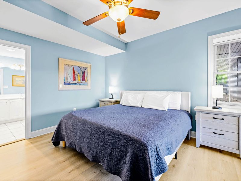Comfortable king bedding and easy access to the outdoors.
