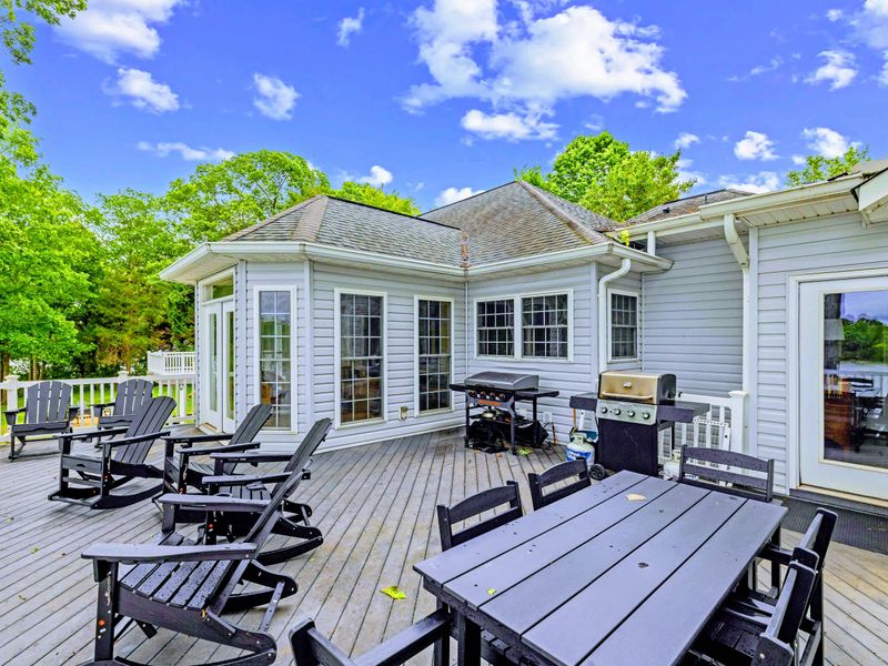 Plenty of deck seating for morning coffee and sunset gatherings.