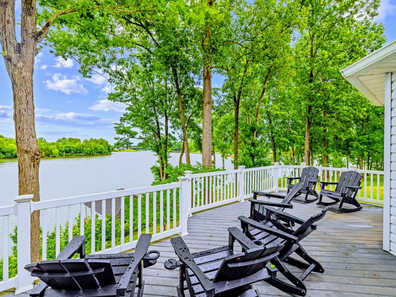 Take in the view from the expansive lake-facing deck.