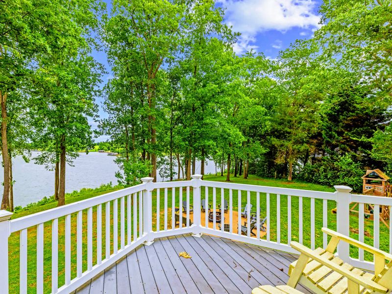 Your own lake-view deck off the primary suite, coffee in hand, water in view.