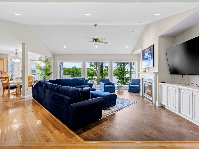 A generous sectional anchors the great room, built for movie nights and easy conversation.