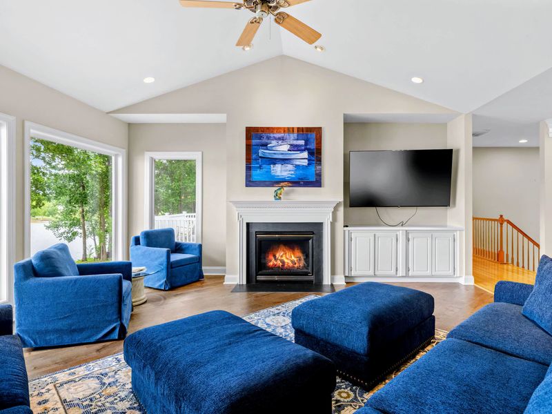 Sink into the sectional with a movie or a book while the cove glows outside.