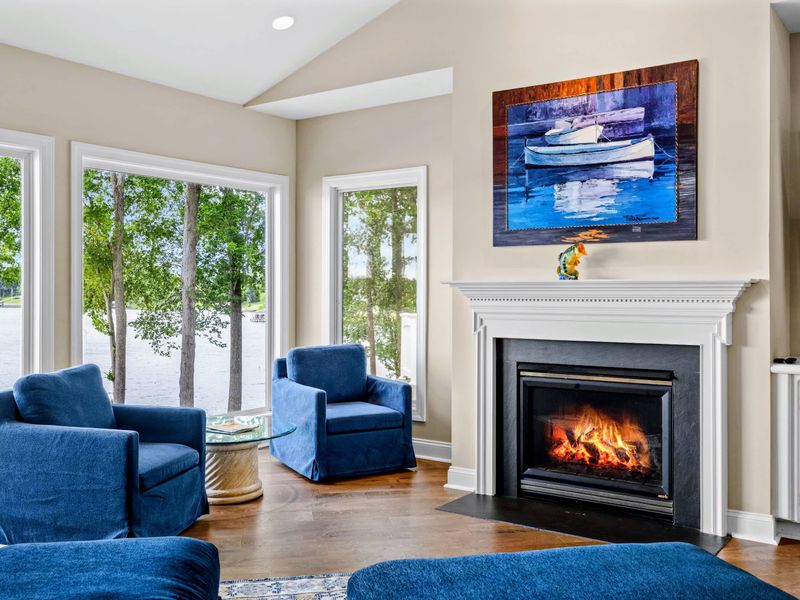 Bright, airy, and lake-focused, the heart of the home.