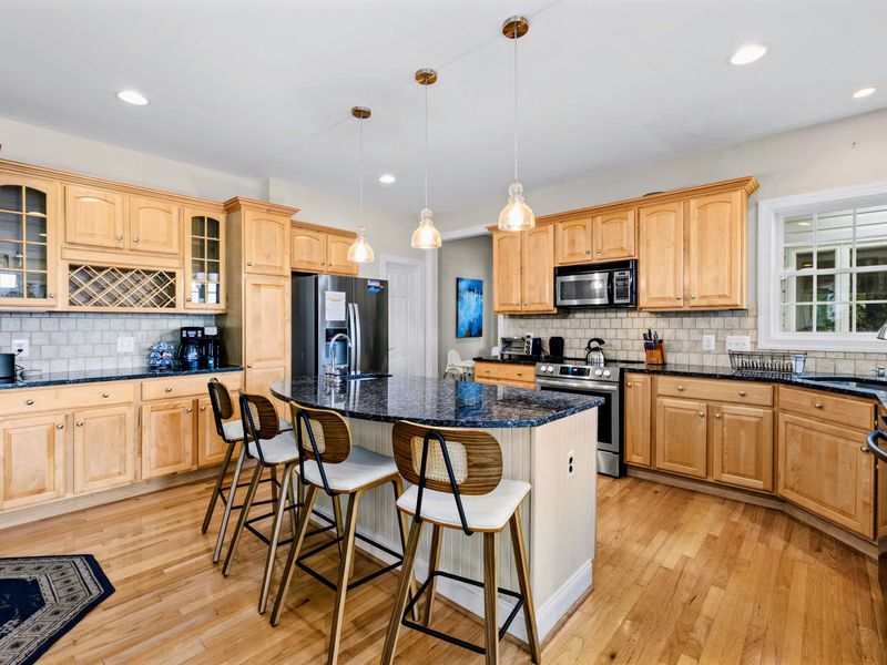 Stainless appliances, abundant counter space, and room for several cooks at once.