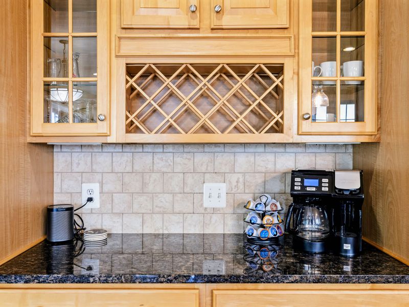 Plenty of counter and cabinet space, plus a coffee bar to start the morning.
