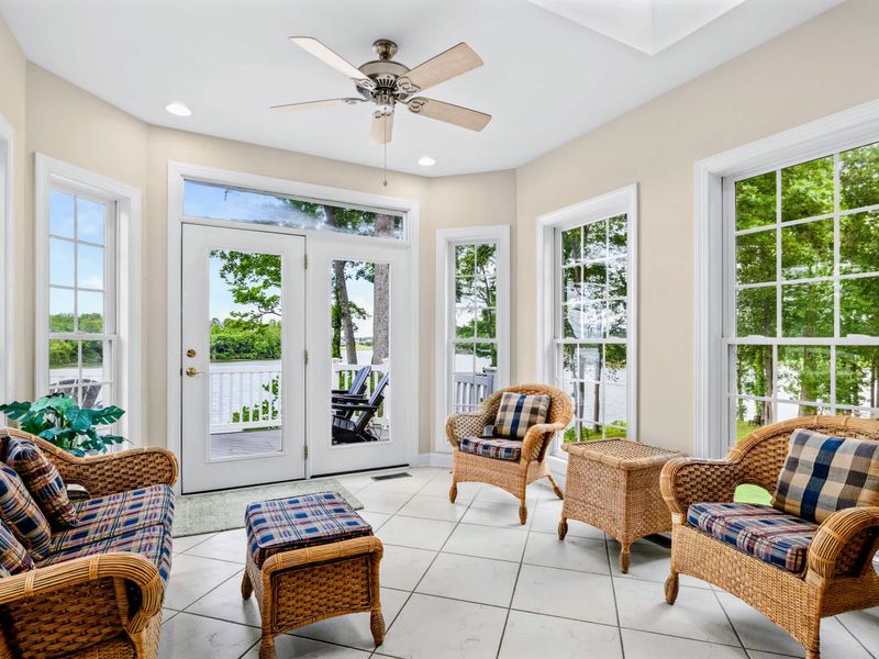 Comfortable seating and endless light make this a favorite spot to unwind.