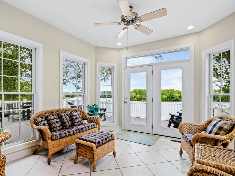 Settle in with the lake on view through the wall of windows.