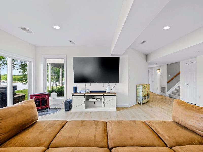 Lounge, play, and gather in the expansive lower-level living space.