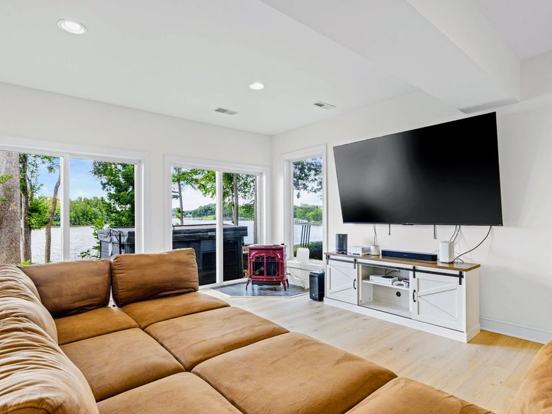 Big-screen TV and easy seating make this the go-to spot for game day and movie night.