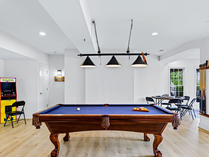 Rack 'em up: the pool table is the centerpiece of the downstairs game room.