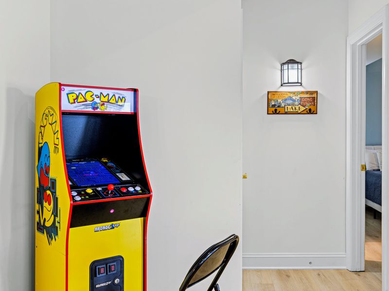 A classic arcade cabinet adds retro fun for all ages.