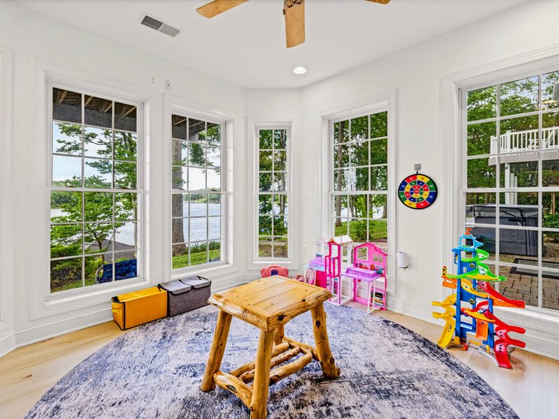 A dedicated kids' play area downstairs, stocked with toys and games.
