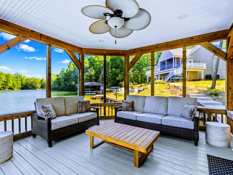 Boathouse Screened Porch - Shaded and screened out over the water, with the home rising up the hill behind, made for a lazy afternoon.
