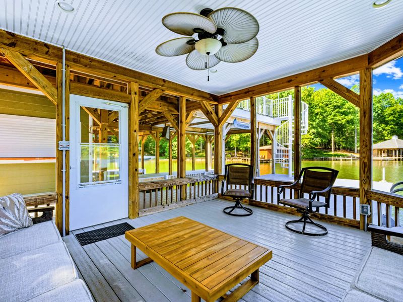 Boathouse Screened Porch - Sink into cushioned seating with the breeze off the water and Lake Anna stretching out beyond the screens.
