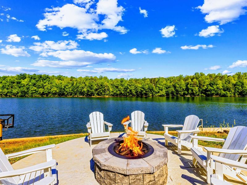 Fire Pit - Steps from the water with the dock in view, this is where the evening keeps going past sunset.