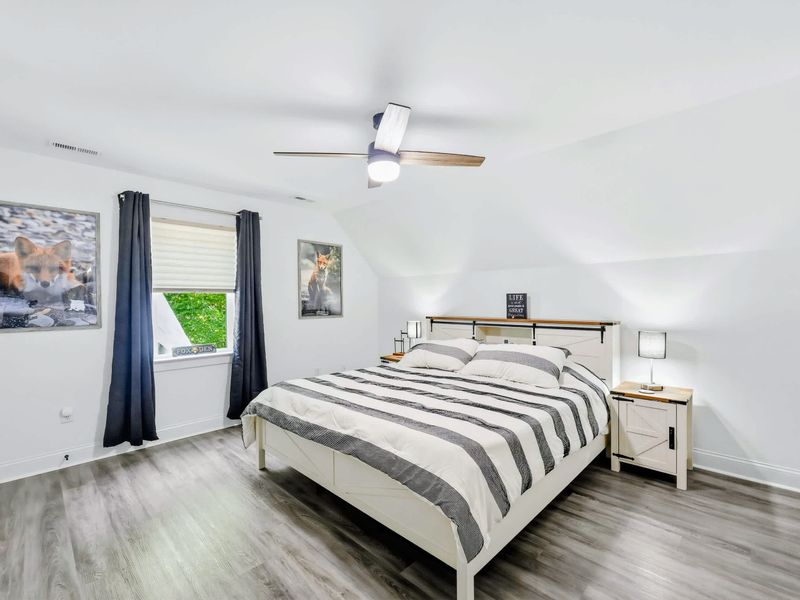 Bedroom - Spacious king layout with ample closet space and a calm, neutral palette.