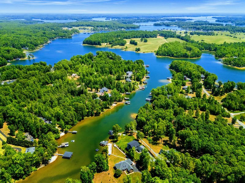 Exterior - Sweeping aerial of wooded coves and open water, the Lake Anna setting in every direction.