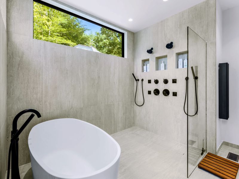 Primary Bath - Soaking tub and walk-in shower share the light from the clerestory window.