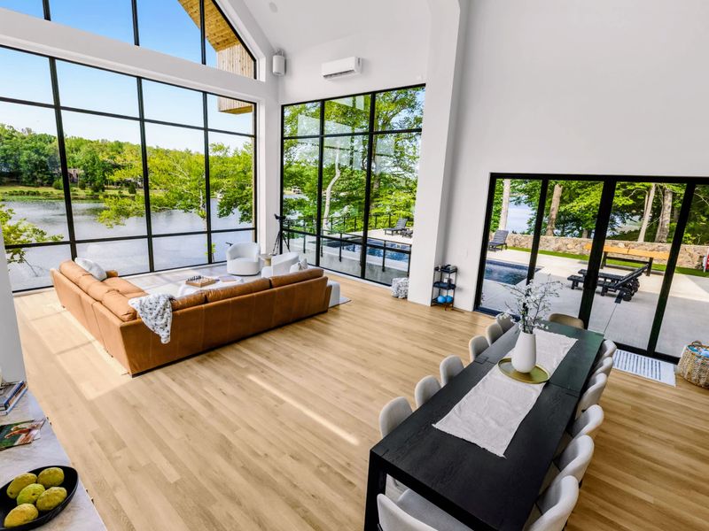 Great Room - Living and dining flow together beneath the vaulted ceiling and open sightlines.