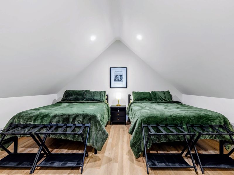 Library Suite - Two queen beds make this a comfortable headquarters for four.