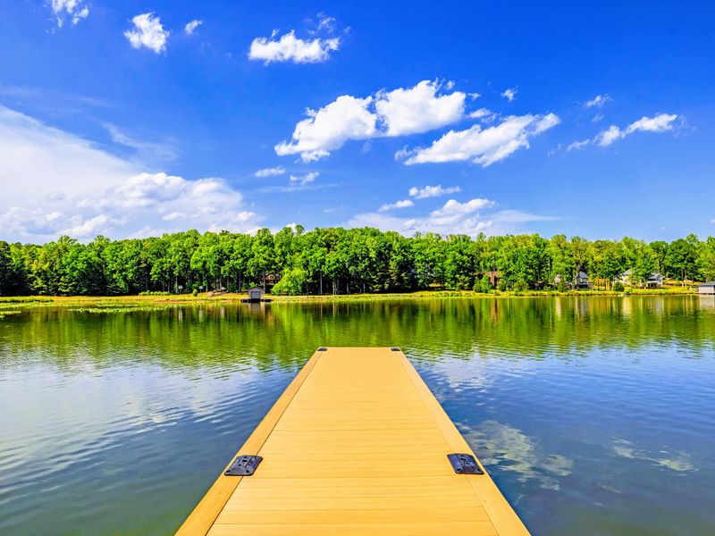 Dock - The walkway leads straight out over the water, fishing rod or coffee mug optional.