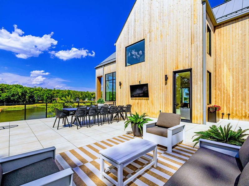 Sunset Patio - One of three outdoor entertaining spaces wrapping the home.