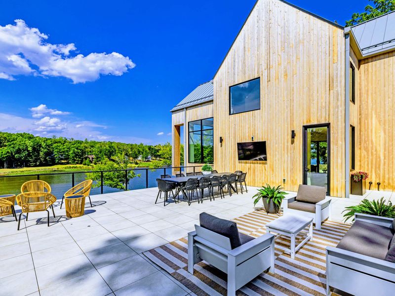 Deck Dining - Eat outside with the water in view and the forest light coming through.