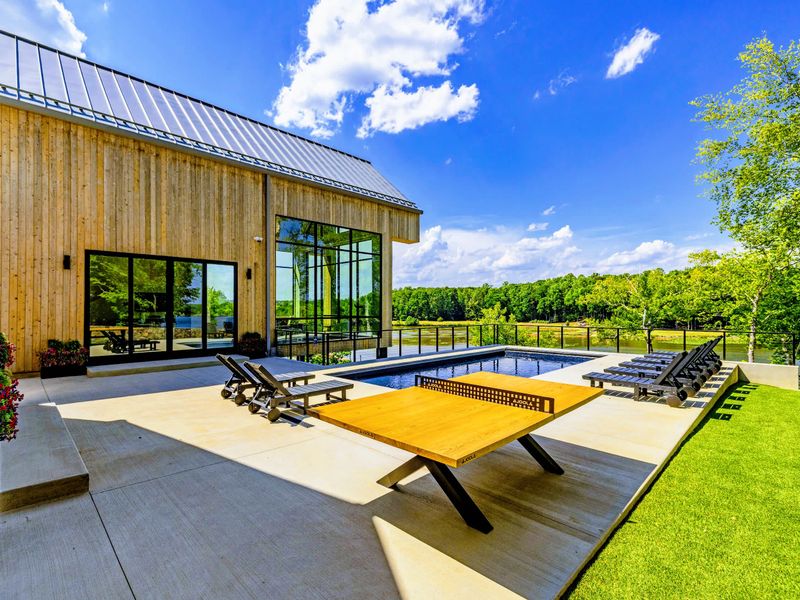 Pool - The pool and the modern house read like one continuous design.