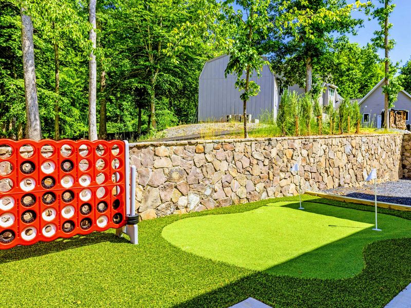 Lawn Games - Turf play areas keep the friendly competition going all afternoon.