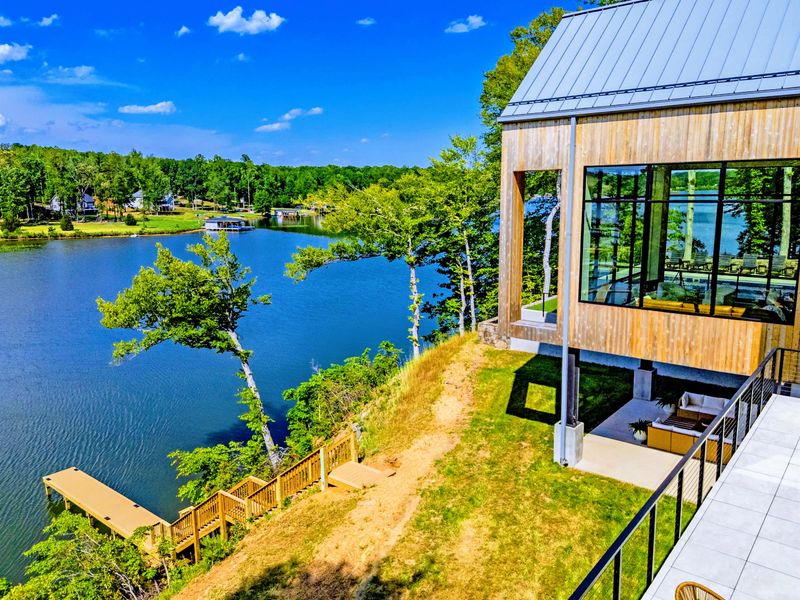 Exterior - The modern A-frame reads like architecture from across the cove.