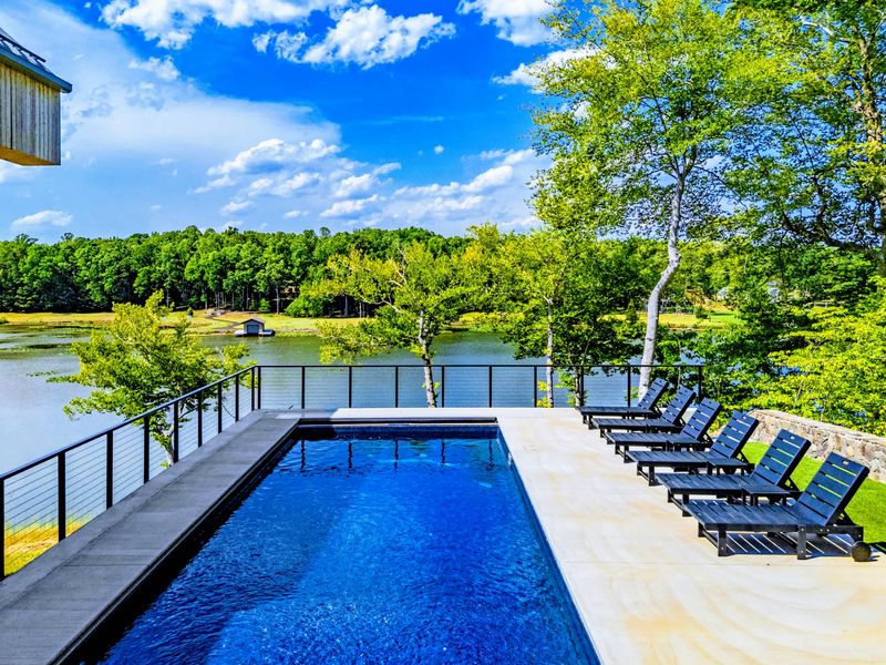 Pool - An overhead view of the pool deck and the home's cedar-and-glass lines.