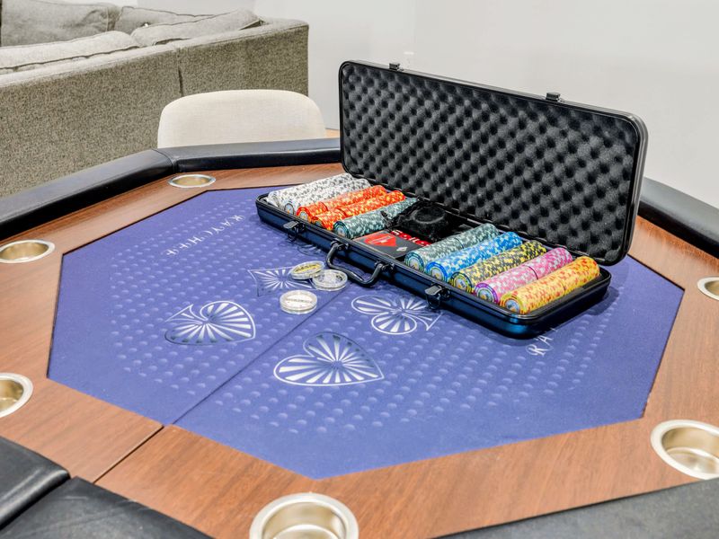 Game Room - The felt-top poker table is set for late-night tournaments.
