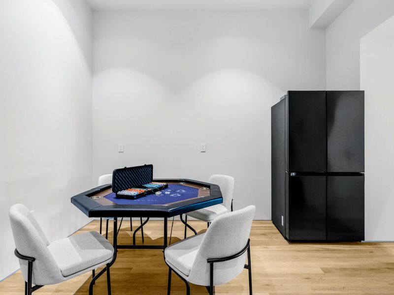 Game Room - Poker table and lounge seating for the after-dinner crowd.