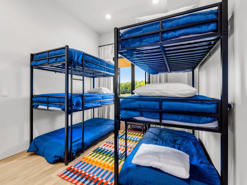 Bunk Room - A lake view and two sets of bunks turn sleepovers into part of the vacation.