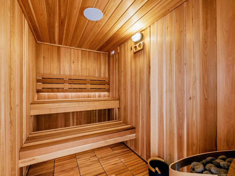 Sauna - A traditional indoor cedar sauna, the heart of the home's Nordic wellness concept.