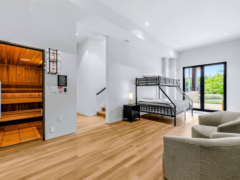 Sauna - The cedar sauna anchors the lower-level wellness corner.