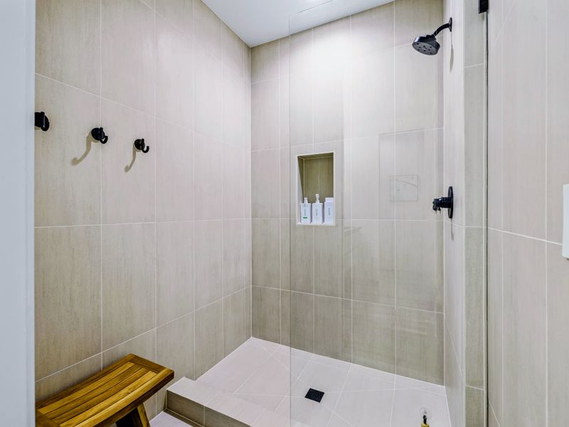 King Bedroom 5 - A spacious walk-in shower finishes the private bath.